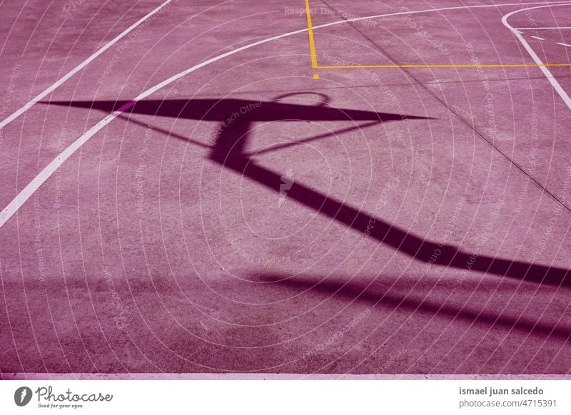 hoop silhouette on the pink street basket court basketball shadow sunlight ground field floor sport equipment game competition play playing abandoned park
