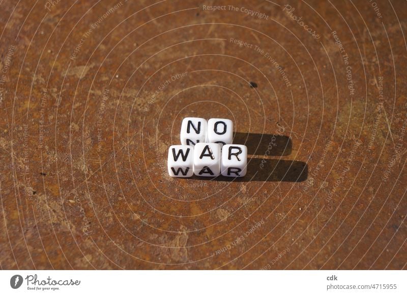 no war No War no war! writing Letters (alphabet) single letter beads black-and-white rusty Brown Old New Characters make a mark Commmunication embassy