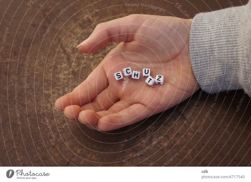 protection Hand Children`s hand Protection Word Language Letters (alphabet) single letter beads embassy Communication Message communication Communicate