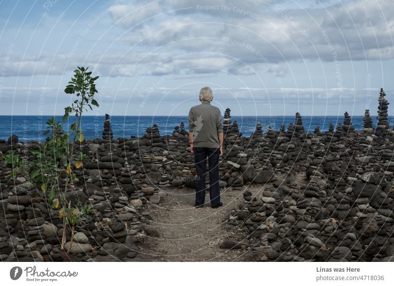 An old man is looking intensively into the blue horizons from the rocky coasts of Tenerife. It’s a moody image that asks more questions than giving the answers. It seems that knowledge definitely comes with the age.