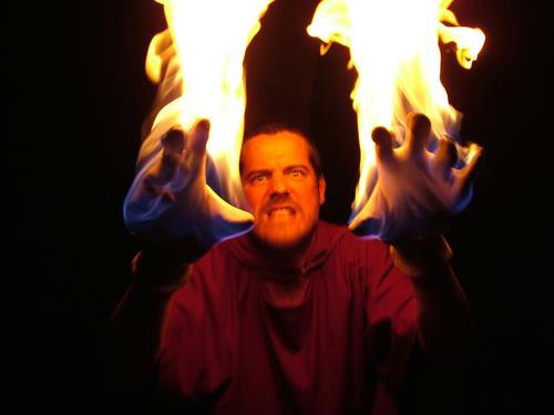 Tim burns Burn Hand Gloves Dark Monster Evil Hot Interior shot Portrait photograph Blaze Flame Arm Stage play Actor Devil