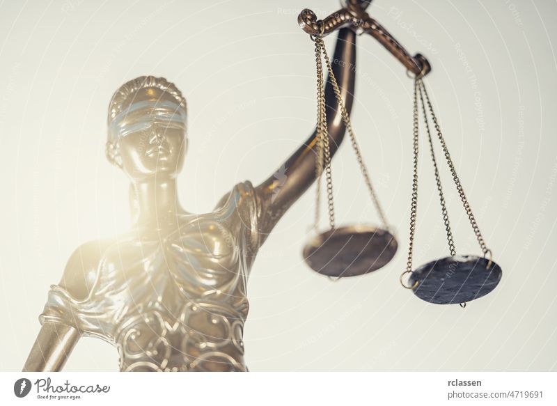 The Statue of Justice - lady justice or Iustitia / Justitia the Roman goddess of Justice lawyer judge legal crime jury court courtroom case verdict government