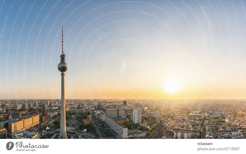 Berlin skyline Panorama Aerial view with famous TV tower at Alexanderplatz in twilight during blue hour at dusk, Germany. copyspace for your individual text.