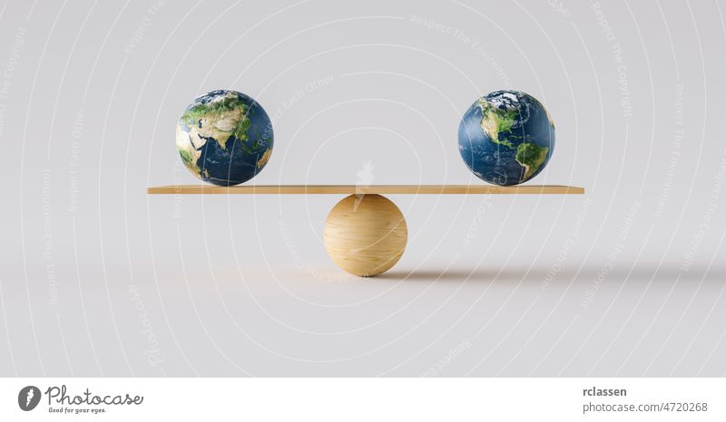 wooden scale balancing two big Earth balls. Concept of harmony and balance earth work space america concept stability rock china planet steady equivalence zen