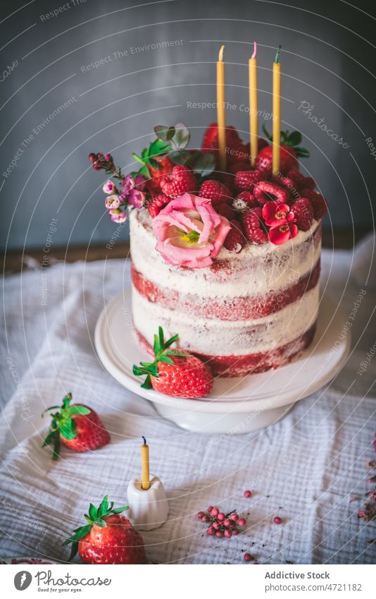 Red velvet cake with candles red velvet strawberry flower decoration dessert sweet confectionery kitchen flavor food yummy tasty delicious serve table