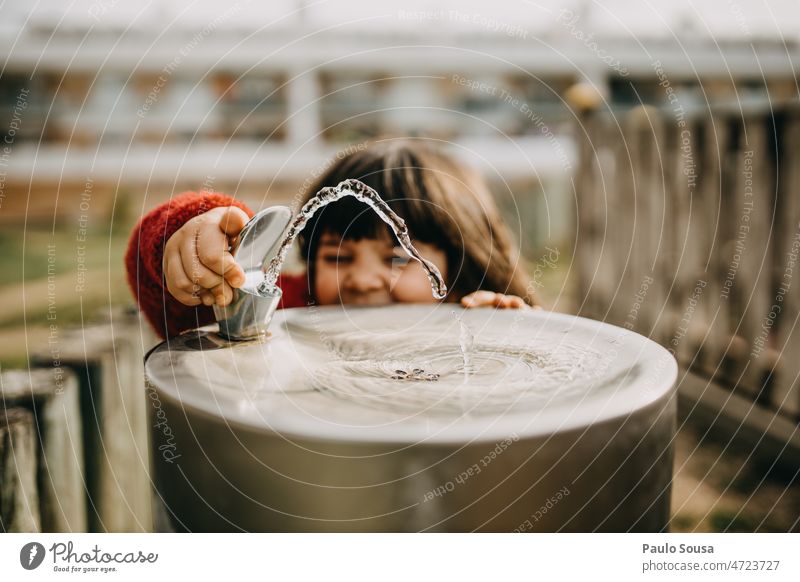 Cute child playing with Park drinking Fountain Child Drinking Water Exterior shot Wet Infancy Joy Day Water fountain Refreshment Fresh Colour photo Cold