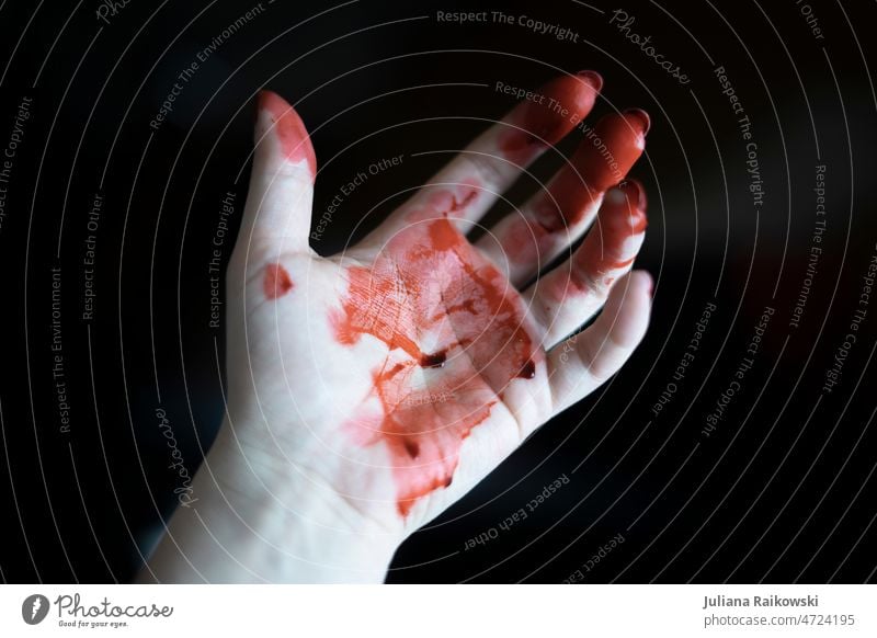bloody hand against black background Blood Red White Pain Accident Wound Skin Healthy Hand Close-up Human being Fingers Colour photo Health care Woman Detail