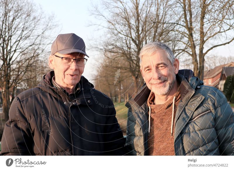 Male friendship - portraits of two male seniors in nature Human being Man Senior citizen age out Winter sunshine Sunlight Evening sun Friendship