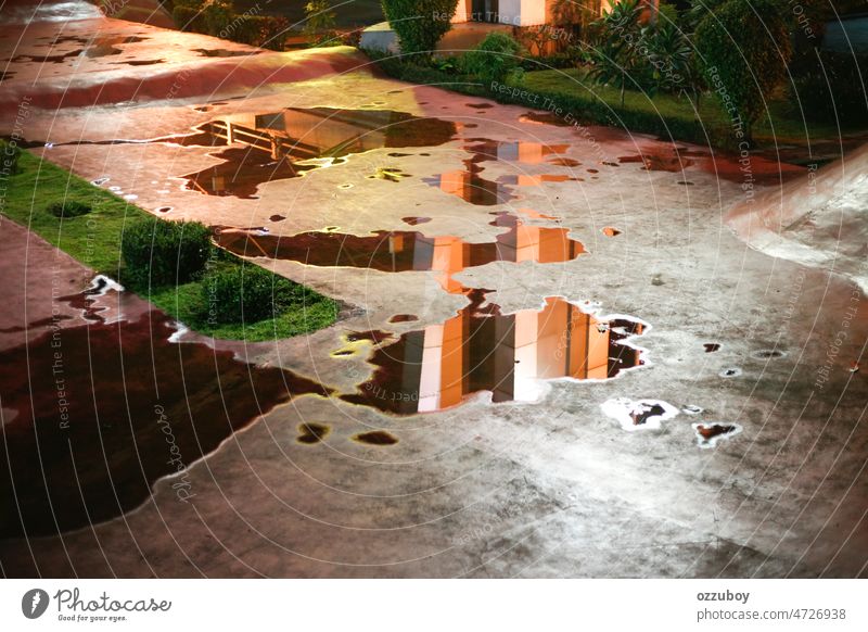 Reflection in rain puddle at park water weather wet reflection nature background outdoor travel drop sky landscape spring street grey no people storm