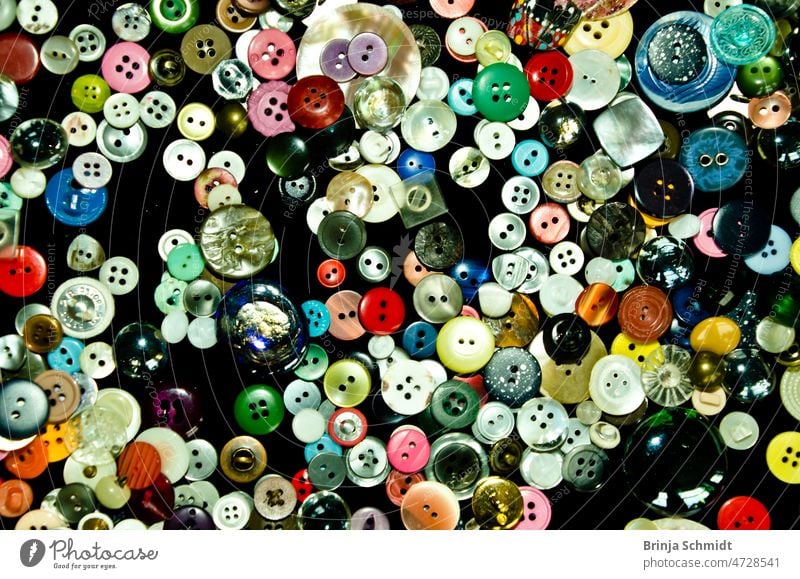 many colorful buttons flat lay on a table, many colorful buttons flat lay on a table Internet Collage fashion object needlework accessory various clothes