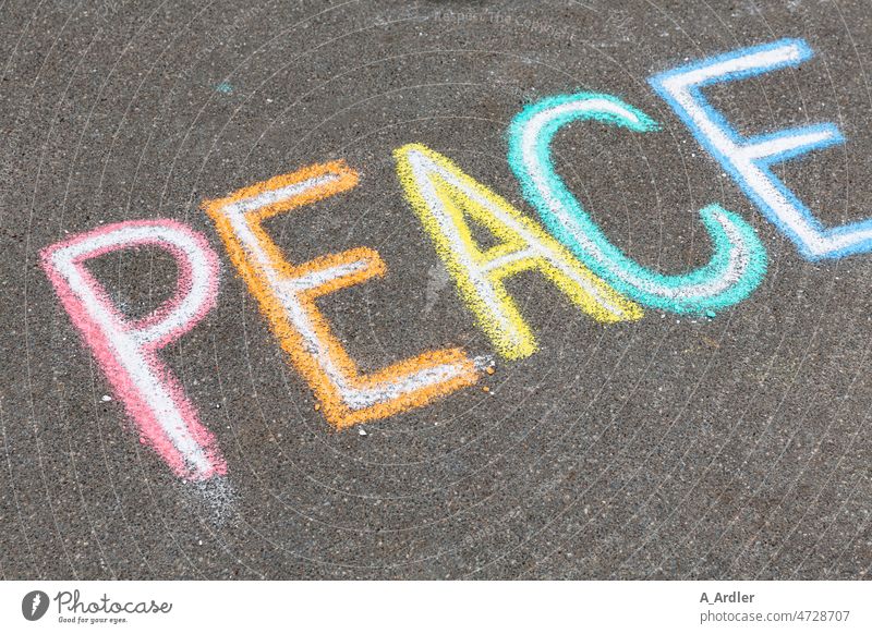 Color lettering PEACE on asphalt peace peace sign Peace Peace Symbols Chalk Chalk drawing chalk writing Chalks Colour colourful Asphalt Asphalt road asphalted