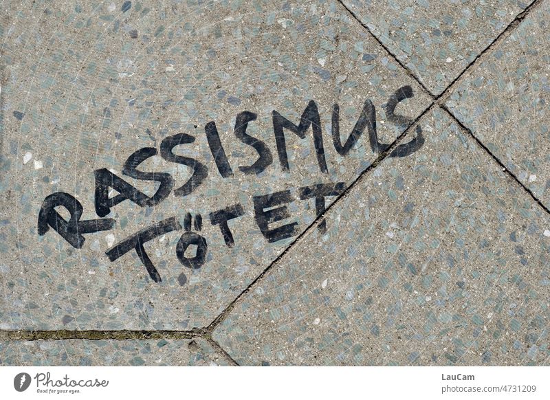 Racism kills - statement on the sidewalk Racism in Germany Racism problem xenophobia xenophobic Human rights Humanity Exclusion Fairness Anger Protest protest