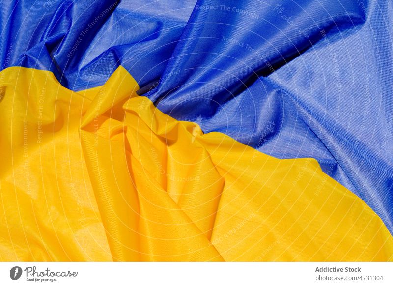 Background with crumpled Ukrainian flag ukrainian national symbol background liberty freedom fabric creased pride style color blue yellow vivid colorful bright