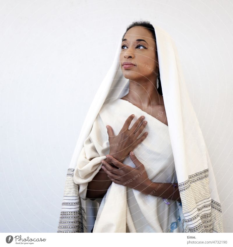 Woman with cloth Rag posture Looking spiritually hands feminine Feminine portrait Upper body