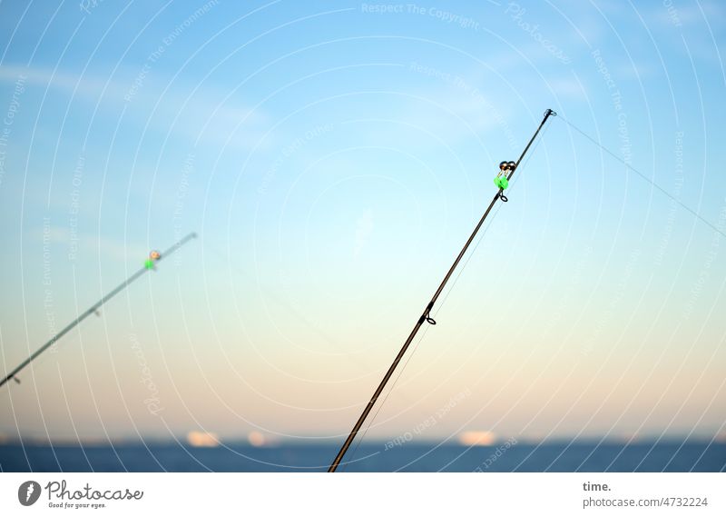 close to nature | two rods, one submerged angler fishing rods Fishing (Angle) Baltic Sea Ocean Horizon evening mood Sky Nature Landscape Environment