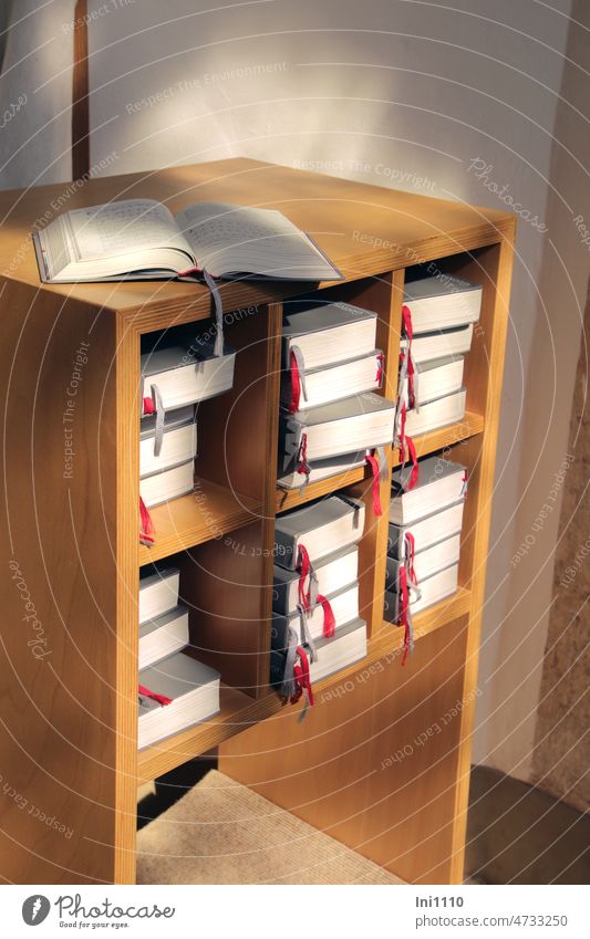 Tea kettle | transshipment point Shelves wooden rack books pile of books Church service Hope Hold Belief praise of God Prayer book Song book Songbook