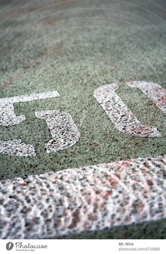 50 Running track fifty Digits and numbers White mark Line Parking garage Birthday Characters Ground Parking lot Parking level Parking space number
