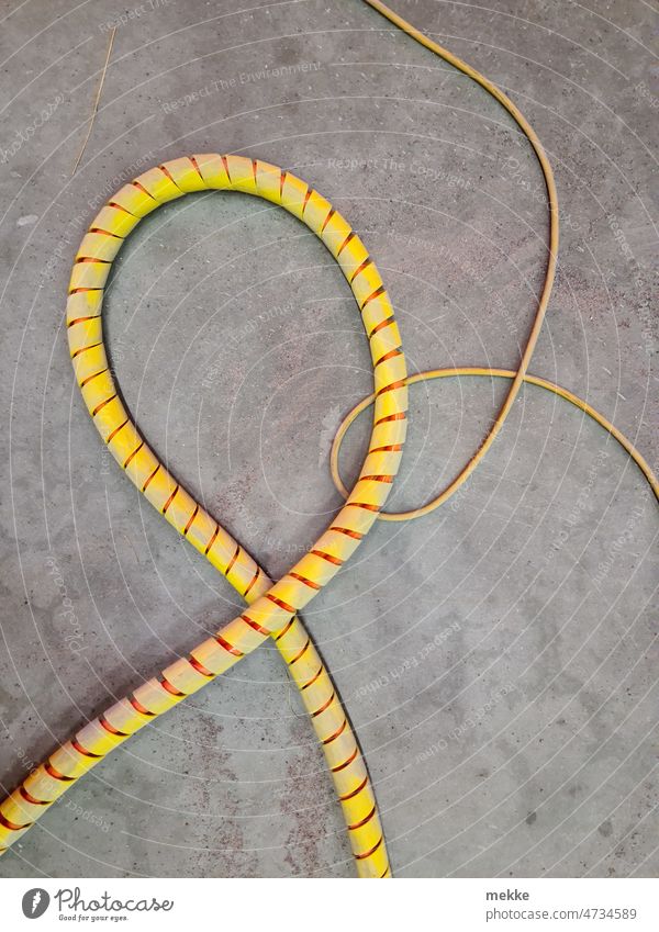 Small and large yellow power cable Cable Energy Electricity Energy industry Transmission lines stream Energy crisis Renewable energy Save energy Environment