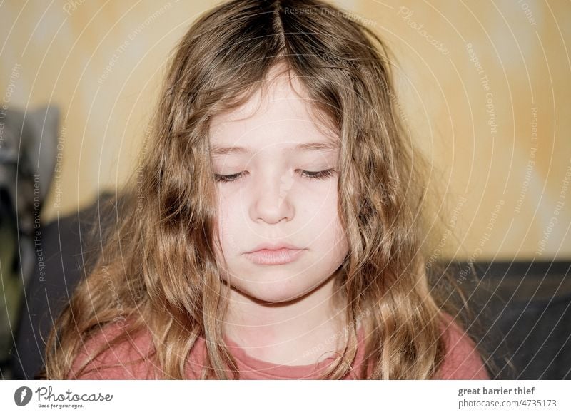 Sad girl Girl Child Infancy curly hair Curl Schoolchild facial expression Face Face of a child Looking Eye colour pout Close-up Human being Head Interior shot