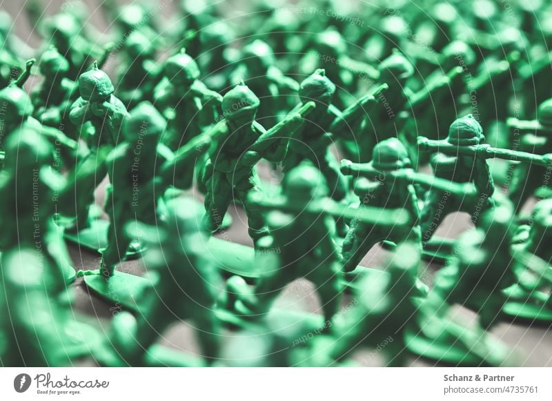 Green toy soldiers in rank and file War Soldier Attack military Combat Toys war toys Heap Uniform Rifle Handgun plastic Plastic Army armed Weapons Command