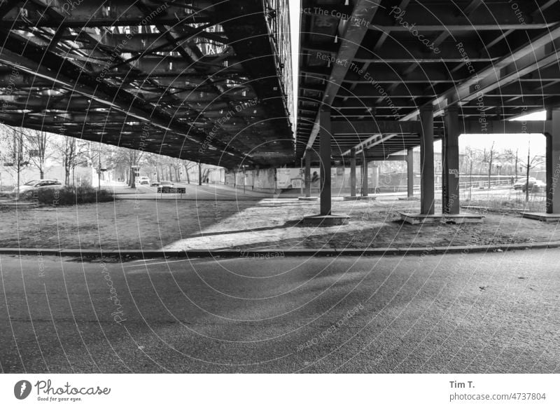 under an old railroad bridge Berlin b/w Bridge Wedding Black & white photo Exterior shot Deserted Town Downtown Capital city Architecture Day Manmade structures