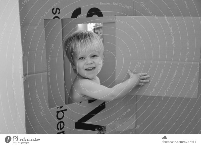 Childhood | Child in a box | Open window: Hello, here I am! Toddler Boy (child) Blonde black and white photo out daylight Joy Laughter Joie de vivre (Vitality)