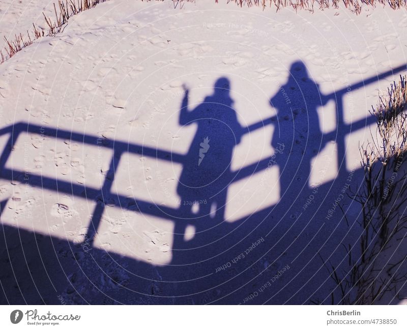 People shadow on beach Shadow Light and shadow Contrast Sunlight Shadow play Silhouette Exterior shot Adults Beautiful weather Beach sunshine Colour photo