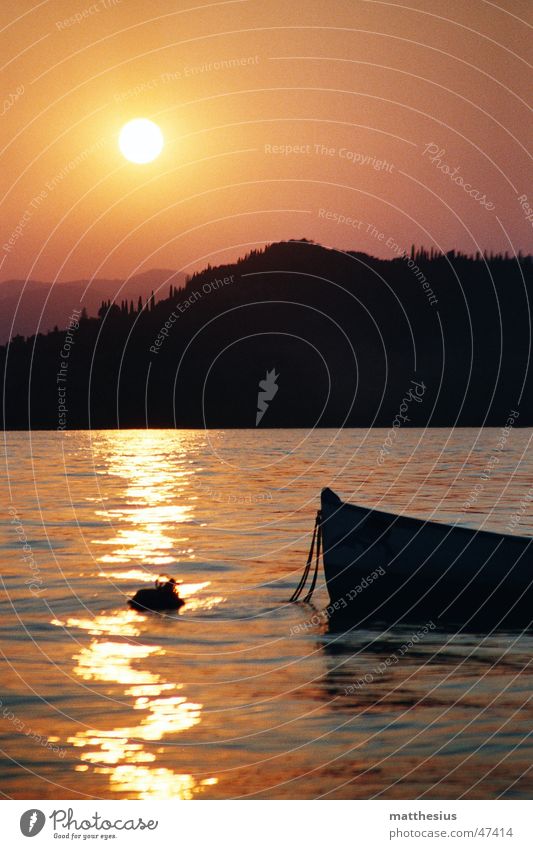 Sunset at Lake Garda Red Bardolino Watercraft Light Fishing boat Romance Physics Orange Shadow Warmth