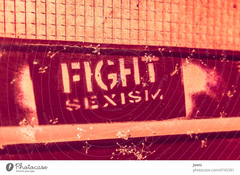 Fight Sexism sexist sexism Characters Graffiti street Street art Mural painting Creativity Daub Wall (barrier) Distinctive colored Red conspicuous Typography