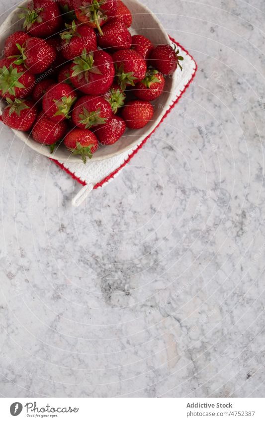 Plate with fresh strawberries on napkin strawberry plate ripe table bunch marble organic folded natural cloth vitamin vegan vegetarian fruit ingredient sweet