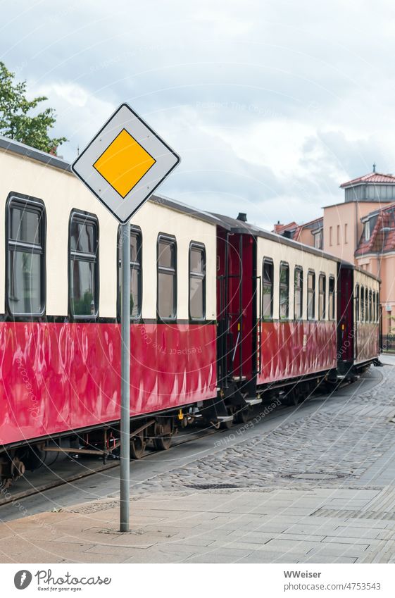 A small old train runs through the middle of a Baltic resort and takes vacationers on request Track Baltic Sea Germany Vacation & Travel Sky Tourism Nature