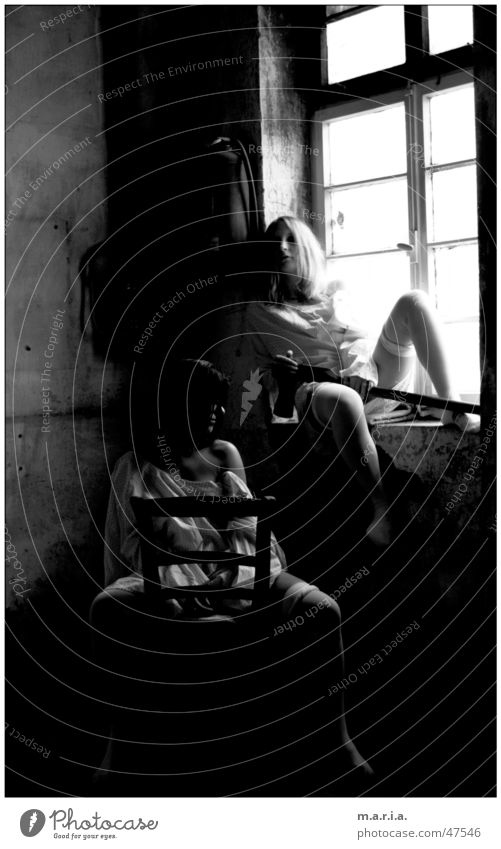 thelma&luise1 Woman Axe Window Light Shoulder Warehouse Dark Location Portrait photograph Human being Chair Skin Legs Black & white photo