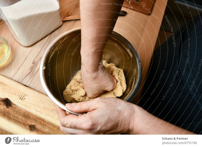 Dough in a metal bowl is kneaded with fist Baking dough hands Kitchen Cake Bread Cookie Flour Food Baked goods Cooking