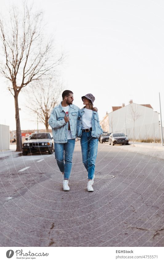 Stylish vintage young couple walking on the road stylish person outdoor woman togetherness two people young adult female retro style street happiness romance