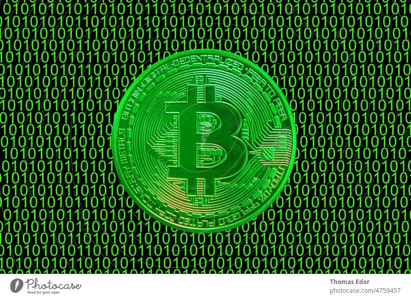green binary code and a valueable green bitcoin from crypto currency straight Bitcoin Ether Ada Cardano Ethereum gold vector Digital Crypto Mining Business