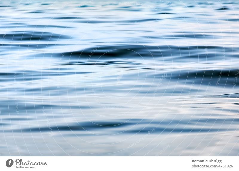 Gentle movement on the water surface Waves wave Water Surface of water element Pure neat Liquid texture background silent tranquillity Ocean Lake Pattern Nature
