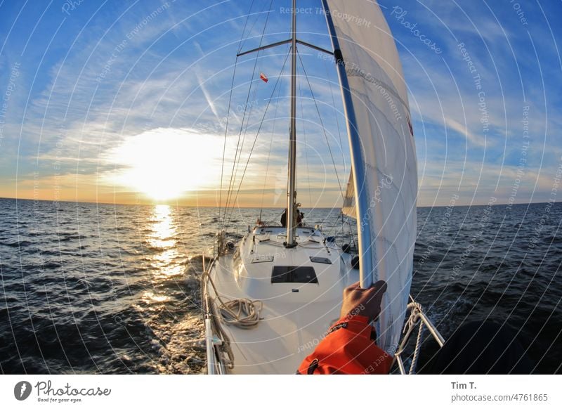 Sailing with friends Baltic Sea Spring ship boat Sailboat Sunlight Hand bow jib Water Ocean Sky Sailing ship Yacht Spring day Navigation Adventure Freedom