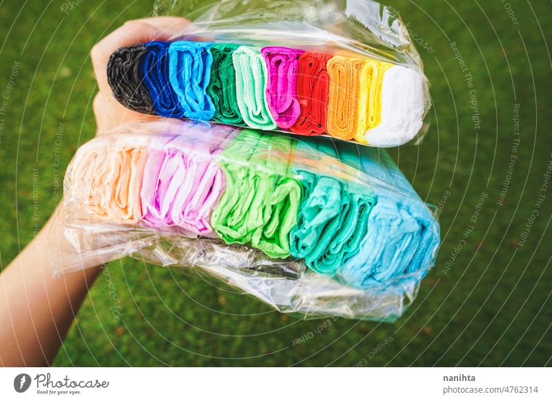 New and colorful packs of a mix of crepe paper diy material school fragile variety new package vibrant brilliant hand hold perspective view plastic ready open