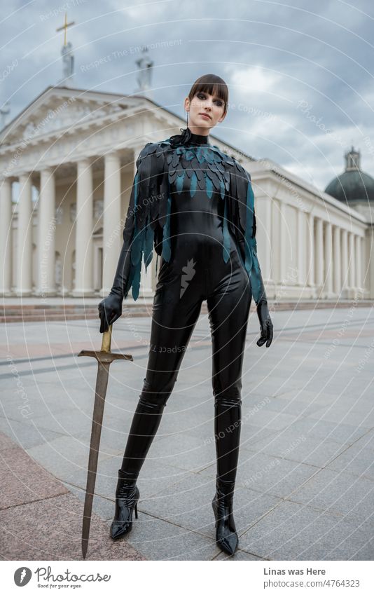 Freedom is the most important. Every country should have one. And while the whole adequate world stands with Ukraine it’s important not to forget about an ongoing war. A model in a fashionable black latex outfit and a sword in her hand.