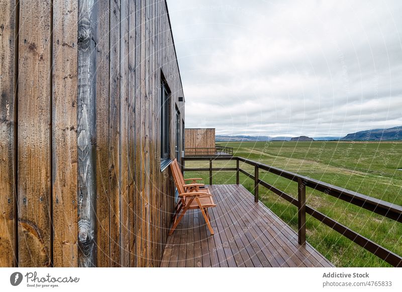 Stylish buildings located in countryside house field terrace residential rural style design settlement environment window grassy dwell iceland hvolsvollur