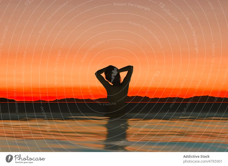 Woman silhouette at sunset woman swimming pool nature summer sunrise young sky person outdoor sunlight evening lifestyle water freedom female girl orange dusk
