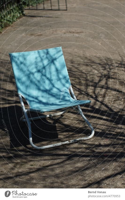 semi-shade Chair Break Penumbra Summer rest Blue Shadow Branchage Shade of a tree Exterior shot Relaxation Deserted Sunlight Nature Sit Colour photo Seating Day