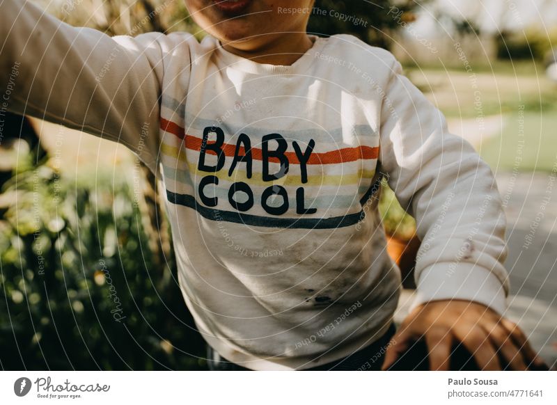 Child with dirty shirt sweatshirt Shirt T-shirt casual young copy space t-shirt lifestyle outside summer nature Dirty childhood cool Baby cool mockup Authentic