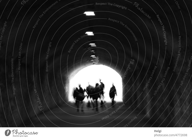 Tunnel vision - several unrecognizable people standing in the light at the end of a tunnel Light Shadow blurriness darkness Dark Contrast Silhouette Back-light