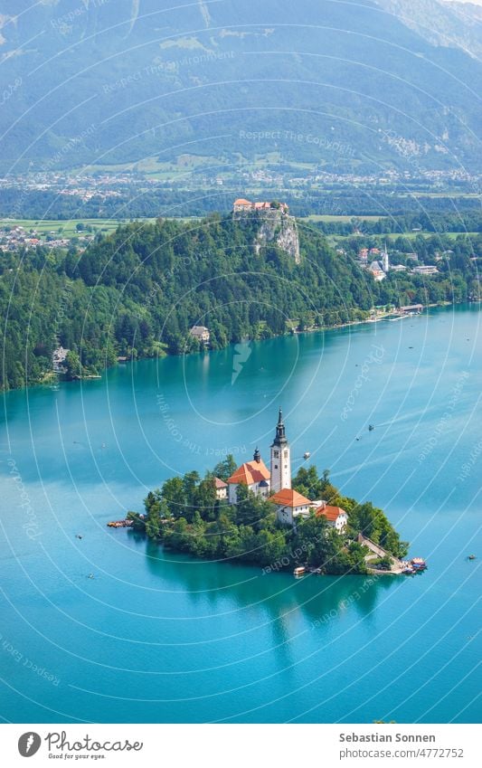 Lake Bled and island with church and castle on the rock in the background in summer, Slovenia, Europe Landscape Summer Church Alps Water Island travel Mountain