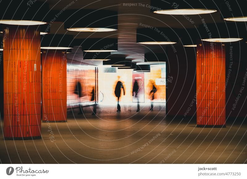 People move underground from daylight inside Orange Underpass Lanes & trails Passage Subsoil Silhouette motion blur Going Tunnel Back-light Symmetry Pedestrian