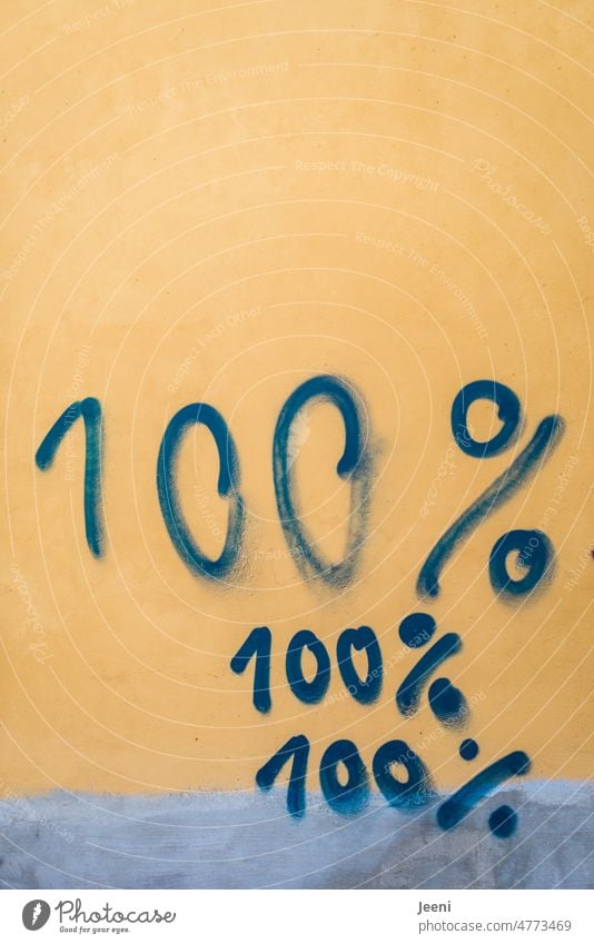That is one hundred percent 100% Percent sign Digits and numbers Graffiti Wall (building) Blue Yellow digit Numbers Sign Wall (barrier) Facade Daub