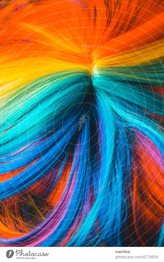 Close up of a multi colored rainbow wig hair texture dyed background soft smooth fantasy haistyle hairdresser stylize colorful multli colored stylish trendy