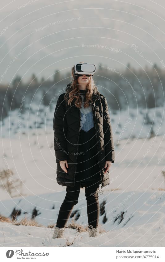 young woman with vr goggles enjoying outdoors 3d 5g design space device digital digital device entertainment equipment experience expression female future