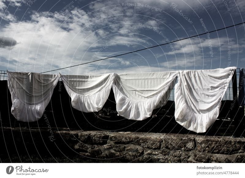 Bed sheets or fitted sheets hang to dry on a fence Laundry clothesline Sheet Bedclothes Dry Washing Washing day Living or residing Clean Hang Household